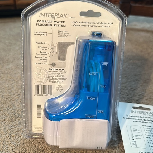 Compact water flossing system with extra jet tips - Picture 2 of 3